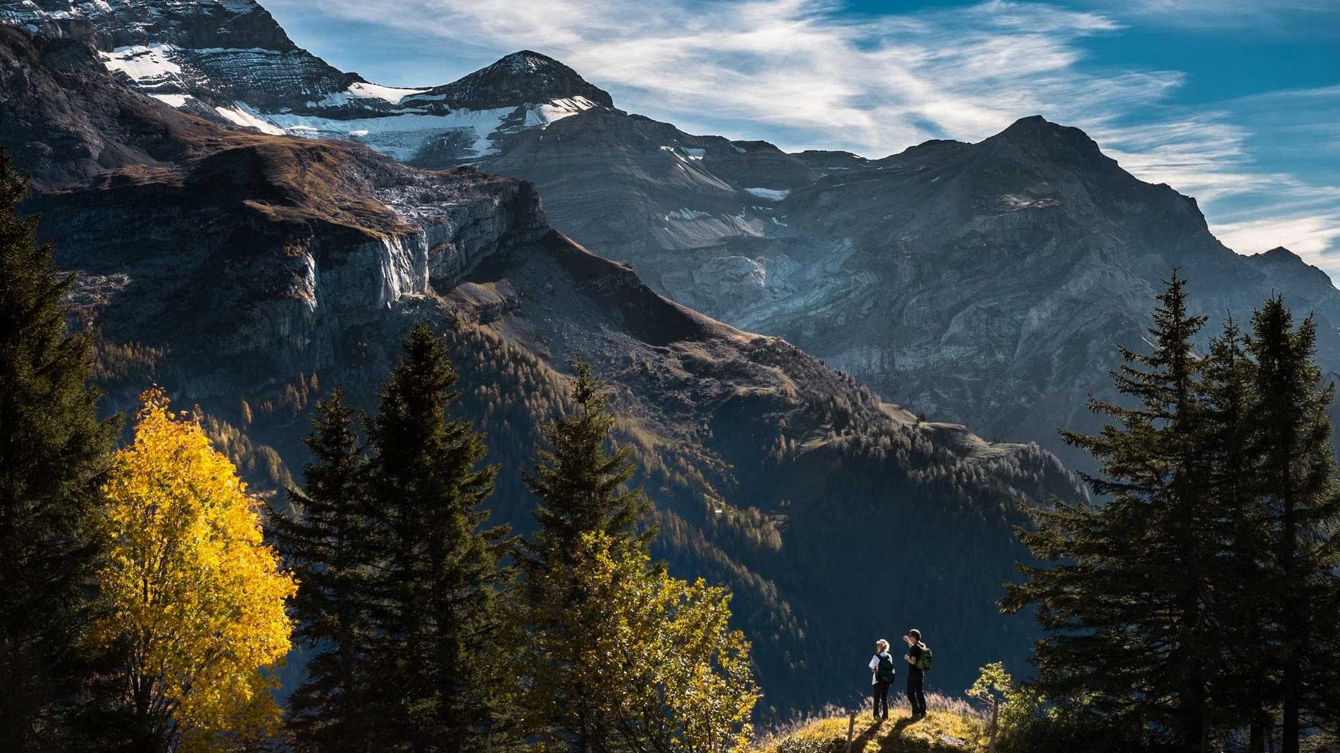 Panoramic view of Kathmandu valley with mountains in the background at sunrise.